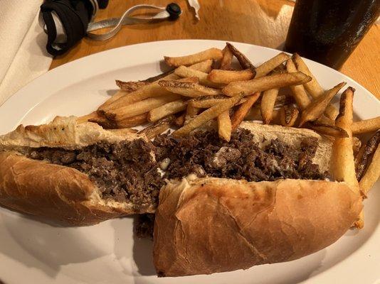 Cheese steak sandwich with fries