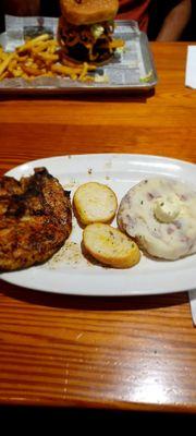 8 ounce grilled chicken with 2 sides : garlic mashed potatoes and Mac and cheese (such a large side, it is in its entire bowl)