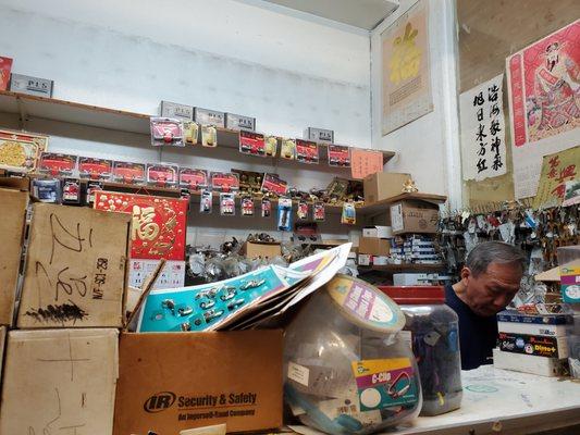 Mr Fon making keys in his charming little hole-in-the-wall shop