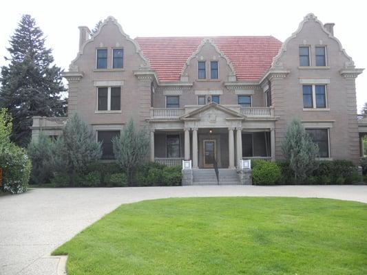 front of 1913 Flemish Revival style mansion