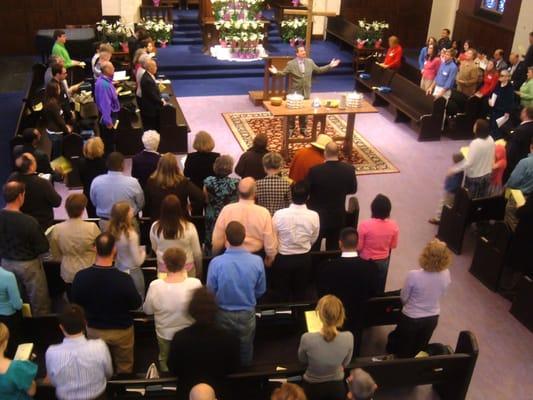 Easter worship, gathered around the Table