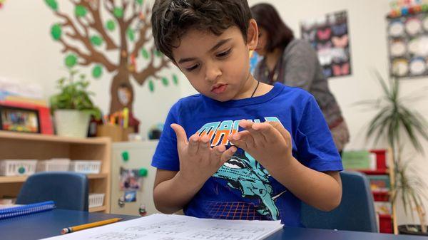 One of our students working on counting.