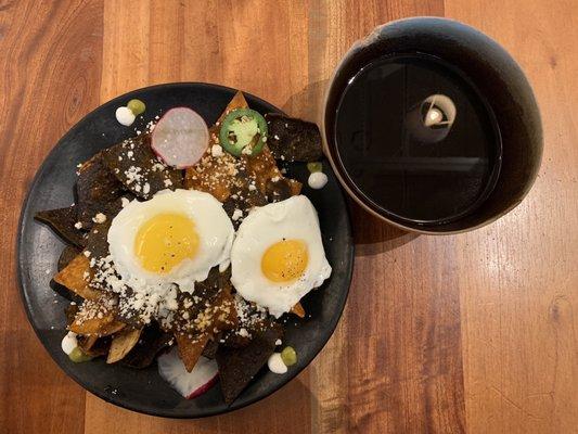 Enchiladas Rojas with two side eggs to top them, and café de olla.