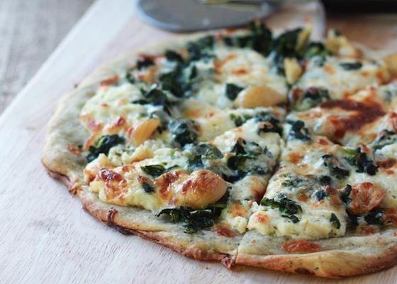 Our 12-inch Ricotta and Spinach toppings on our signature Sourdough crust from Sourdough Pizzeria.