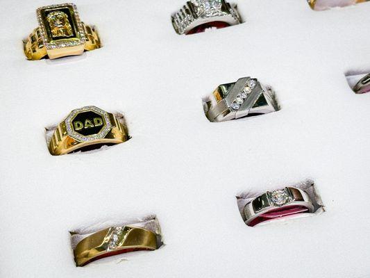 mens fashion rings on display