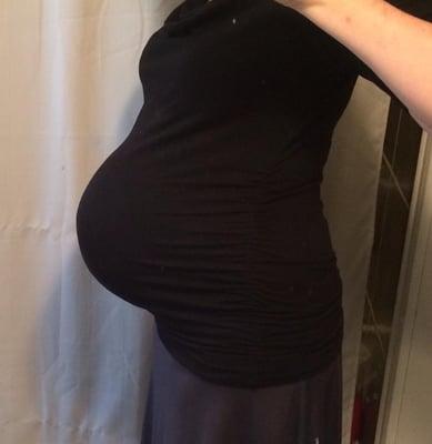 Surrogate mother very pregnant with twins and doing a beautiful job!