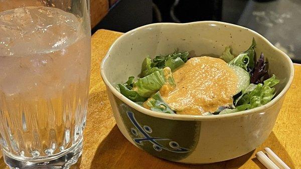 Salad and ginger dressing.