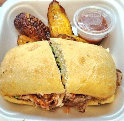 Twisted Roots sandwich with a side of plantains, $16. It's messy but very flavorful.