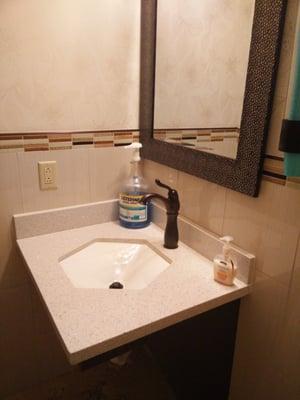 Move bathroom and an industrial sized bottle of mouth wash.