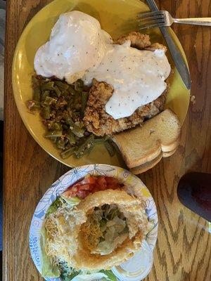 Pork loin, mashed potatoes, green beans and a salad