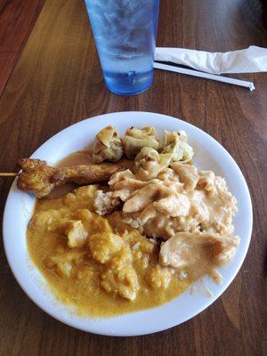 Yellow curry, panang curry, chicken satay, fried rice and steamed dumplings.