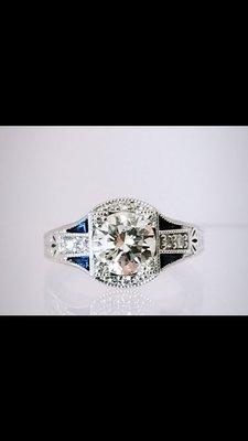 Custom made platinum diamond sapphire ring.