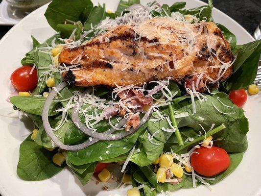 Grilled Atlantic Salmon Salad - spinach, roasted corn, red onion, grape tomatoes, bacon with a white balsamic vinaigrette. No capers for me!