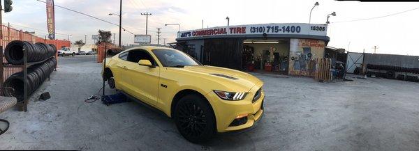 The pony getting his tire patched