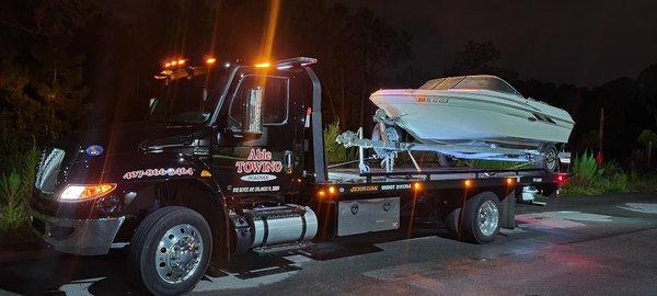 Towing a boat and trailer  For 24/7 Towing, Roadside, and Marine Transport call Able Towing Cocoa 321-444-6379