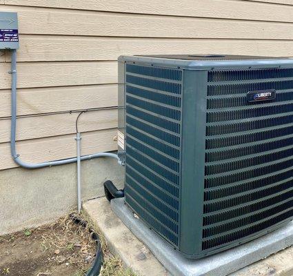 Heat pump outdoor unit installation.