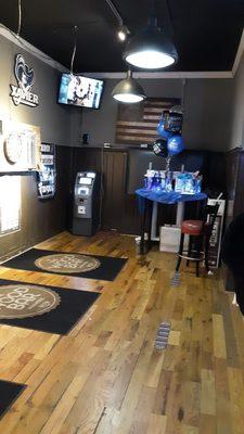 Example of sports room with two billiards tables and several dart boards.