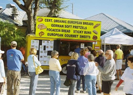 Waiting for the next batch of freshly baked Certified Organic Breads to come out of the Stone Oven inside this mobile Bakery.