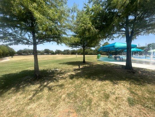 Huge field behind splash pad