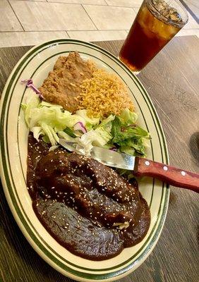 Pollo Relleno: chicken stuffed with mushrooms & spinach covered in mole sauce!