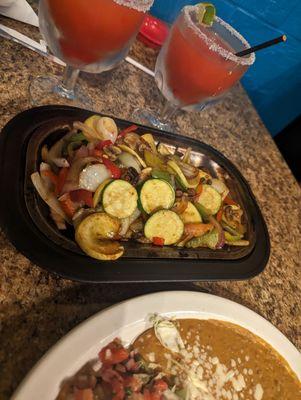 Vegetarian fajitas (for one!) and frozen strawberry house margaritas