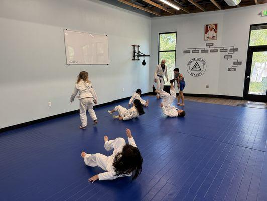 Break falls for safety during kids class.