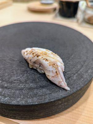 Blackthroat seaperch aburi (seared) nigiri sushi. Rare fish. Skin has a lot of gelatin - tastiest part.