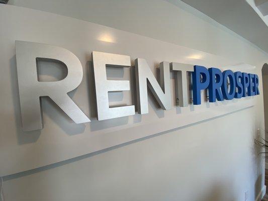 A awesome Rent Prosper wall signage built by one of our awesome team members' friends (who builds signs for Disney)!