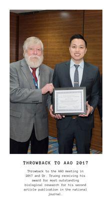 Dr. Truong receiving an award in 2017 for best biological research for his article publication in the AJODO.