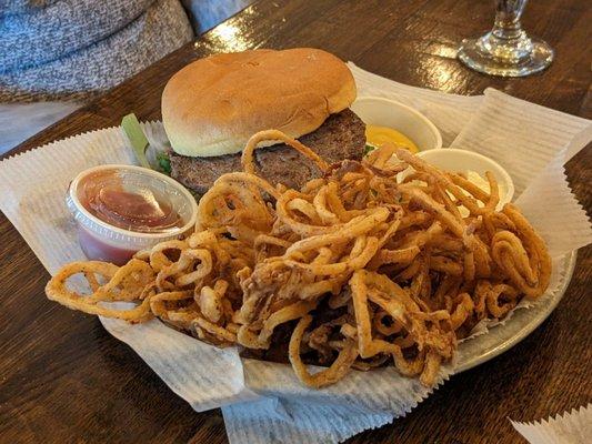 Monk burger with a side of skinny onion fries