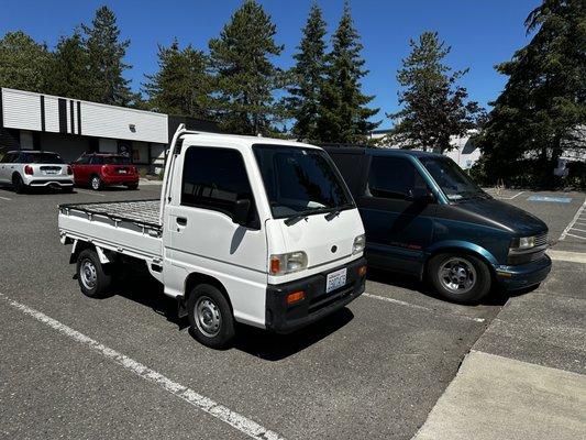 Our customers new truck sitting next to our mobile glass van