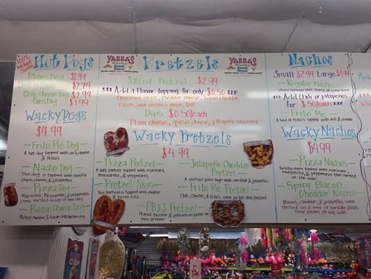 Food menu featuring hot dogs, pretzels, and nachos.