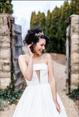 Curly, natural textured bespoke bridal styles are a Deluxe favorite.