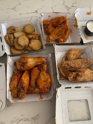 Fried Pickles, Asian Zing, Lemon Pepper (Dry Seasoning), and Mild wings.