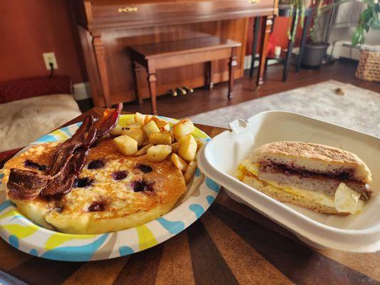 Blueberry pancake, bacon, home fries, and the Piermont sandwich. Chefs kiss!