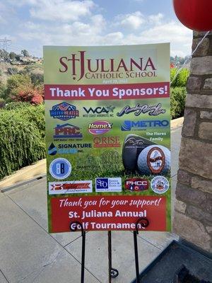 rise Mortgage & Real Estate supporting Saint Juliana's Catholic school charity event.