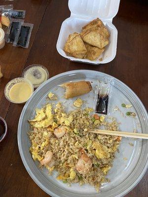 Half a portion of shrimp fried rice (comes with 8 shrimp total) , half an egg roll, and crab rangoons (comes with 6)