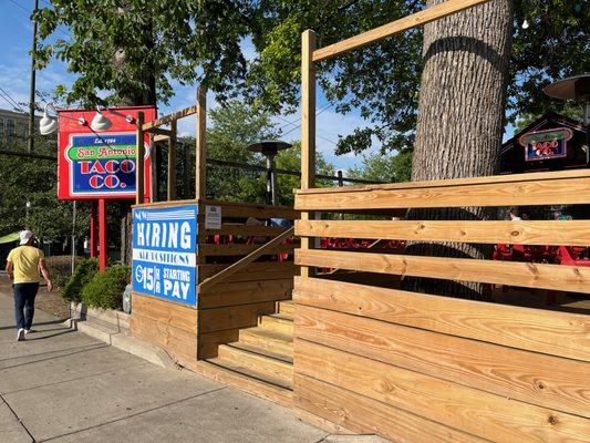 Summertime in Nashville 2023. One can tell by the afternoon sun beating down on the front deck and the "help wanted" sign.