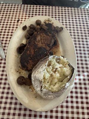 12oz New York Strip Steak with Mushrooms and a Baked Potato.