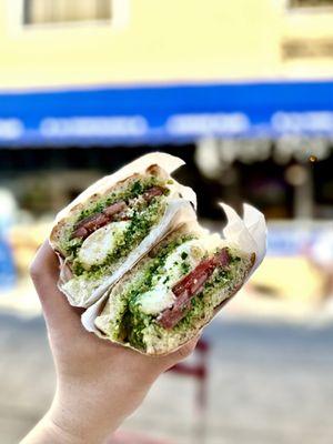 Burrata Rocket - Arugula Pesto, Burrata Mozzarella, Black Pepper, Tomato, and Focaccia Bread