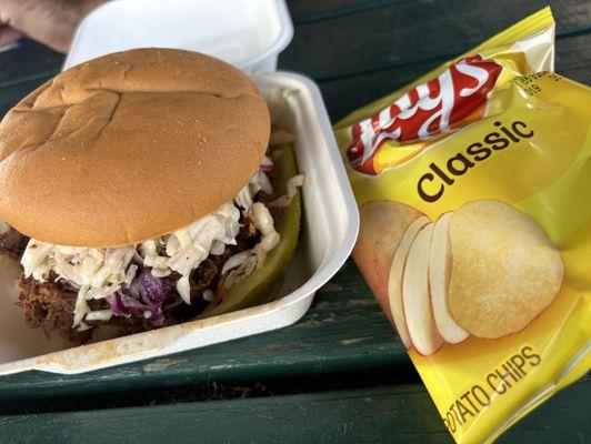 north carolina pulled pork on gluten-free bun, served with chips