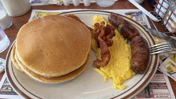 Big Breakfast: 2 eggs your choice, 2 sausage links, 2 bacon strips, and 3 buttermilk pancakes.