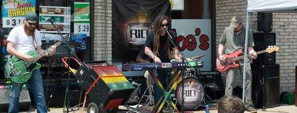 R.i.O. rockin out in front of the shop during a benefit for a local charity host by Papa Joe's.