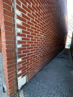 The side of the brick building of Hanley Sound currently occupied by Dunkin' Donuts in Medford MA.