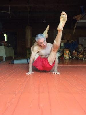 Paul doing yoga at 60 years old