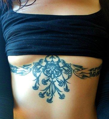 Custom Turkish design sternum tattoo