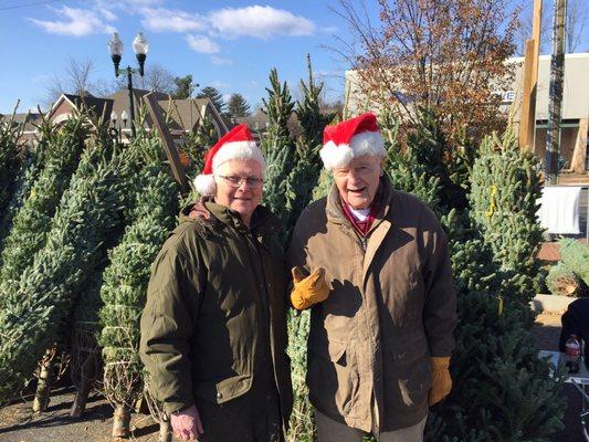 Two veteran Lions Club Christmas Tree Lot volunteers. Mr Jess (Right) aka the "tree whisperer" has worked here over 30 yrs.