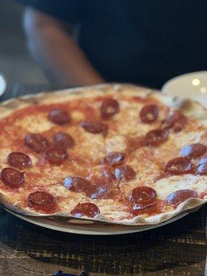 Pizza with spicy salami