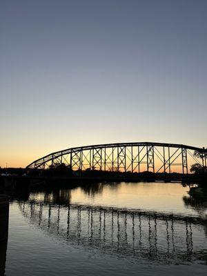 Bridge across the street from the hotel at sunset.