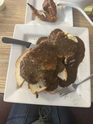 Open faced roast beef sandwich with potatoes and gravy. Potatoes are powdered. Gravy was also a little too salty.